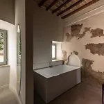 לינה וארוחת בוקר Palazzo Sbaraglini אסיסי